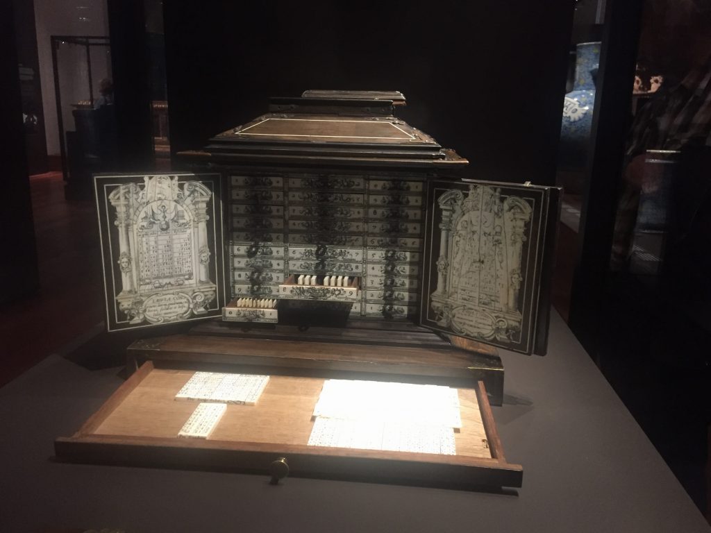 An ornately carved, portable version of Napier's Bones, a calculating engine